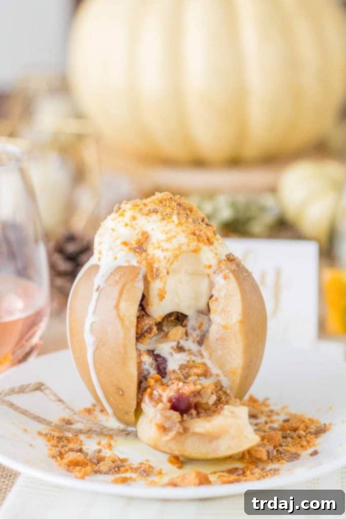 Delicious Fuji apples stuffed with Butterfinger crumb topping, ready for Friendsgiving