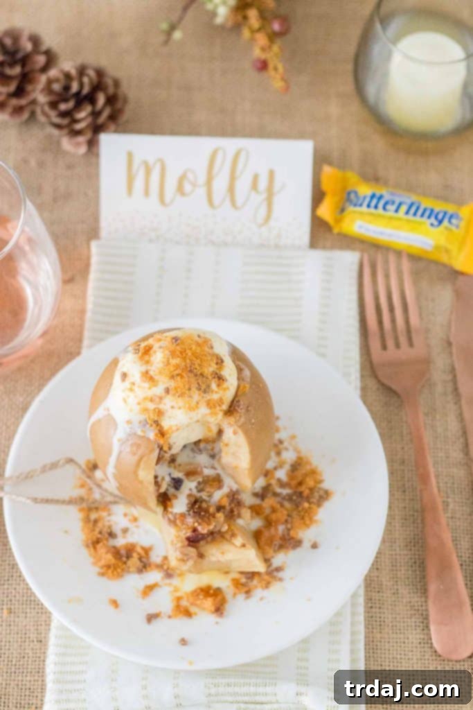 Prep shot of apples being stuffed with Butterfinger crumb topping
