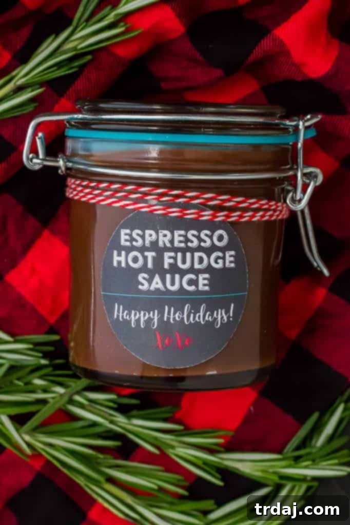 Espresso Hot Fudge Sauce drizzled over vanilla ice cream with crushed peppermint