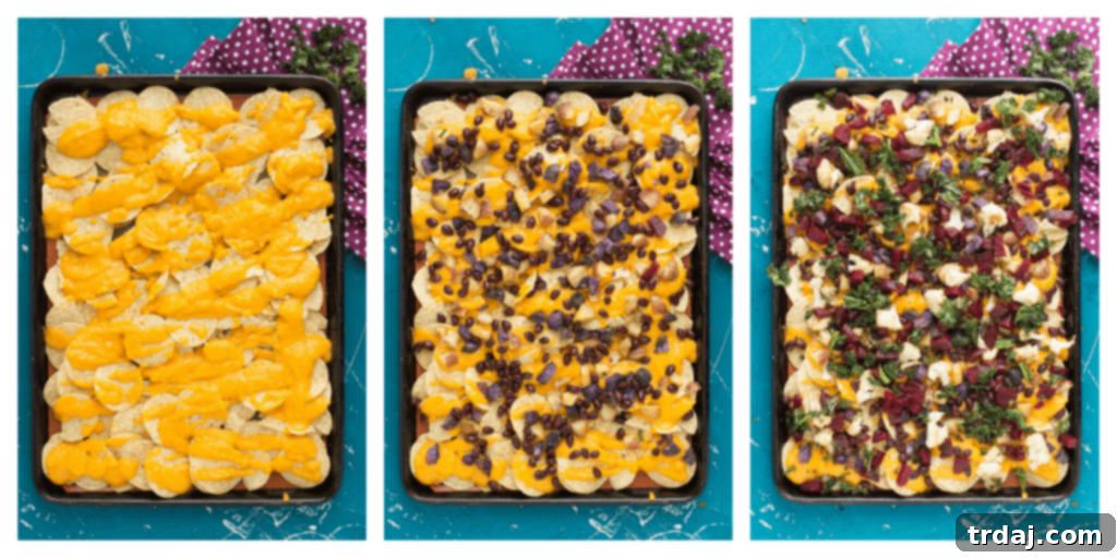Fall Bounty Sheet Pan Nachos have butternut squash nacho cheese sauce, black beans, kale, roasted cauliflower and beets to give you the ultimate in snacking with all of Fall's delicious produce! | Strawberry Blondie Kitchen