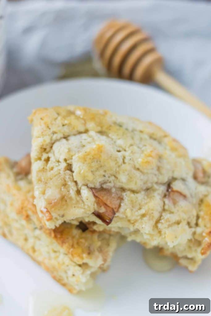 Soft and sweet, with pillows of pear and rich blue cheese and a drizzle of honey, these Pear and Blue Cheese Scones are the perfect pair with your morning cup of coffee! | Strawberry Blondie Kitchen