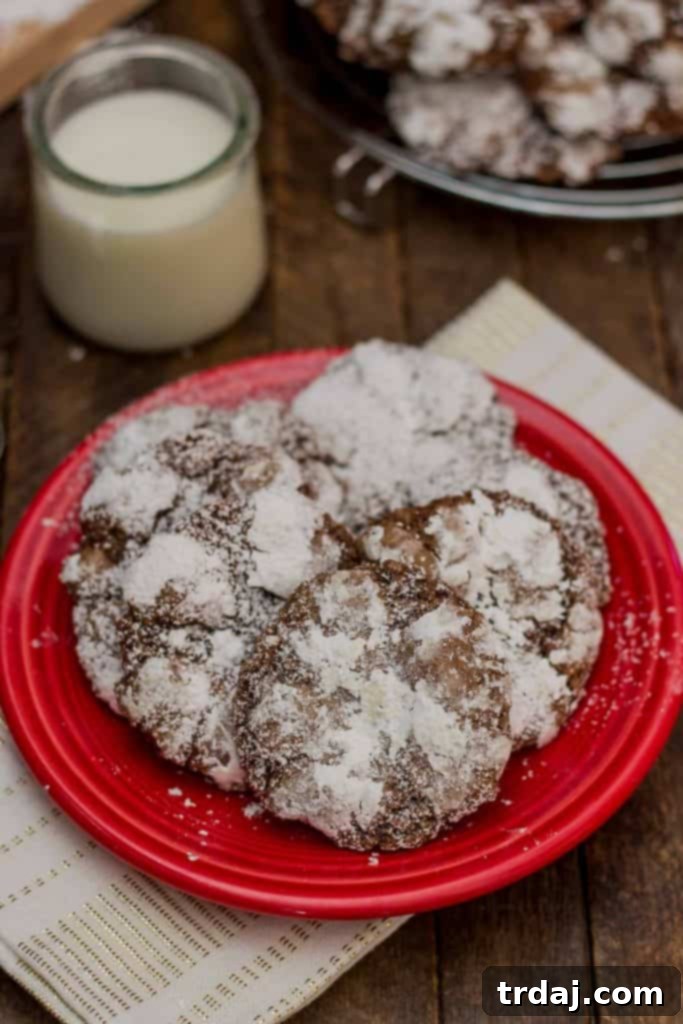 A festive spread of Peppermint Crinkle Cookies on a baking rack, ready to be shared and enjoyed during the holidays.