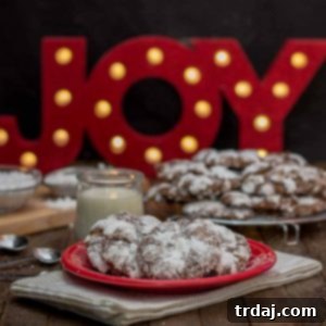 Peppermint Crinkle Cookies are delicious, chocolaty, minty bites of cookies suitable for the big guy himself! | Strawberry Blondie Kitchen