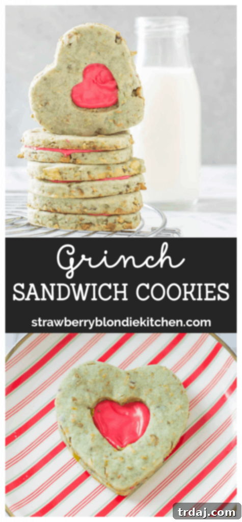 Collection of Grinch Sandwich Cookies with green pistachio shortbread and red heart centers, presented on a festive plate, ready for gifting or sharing.