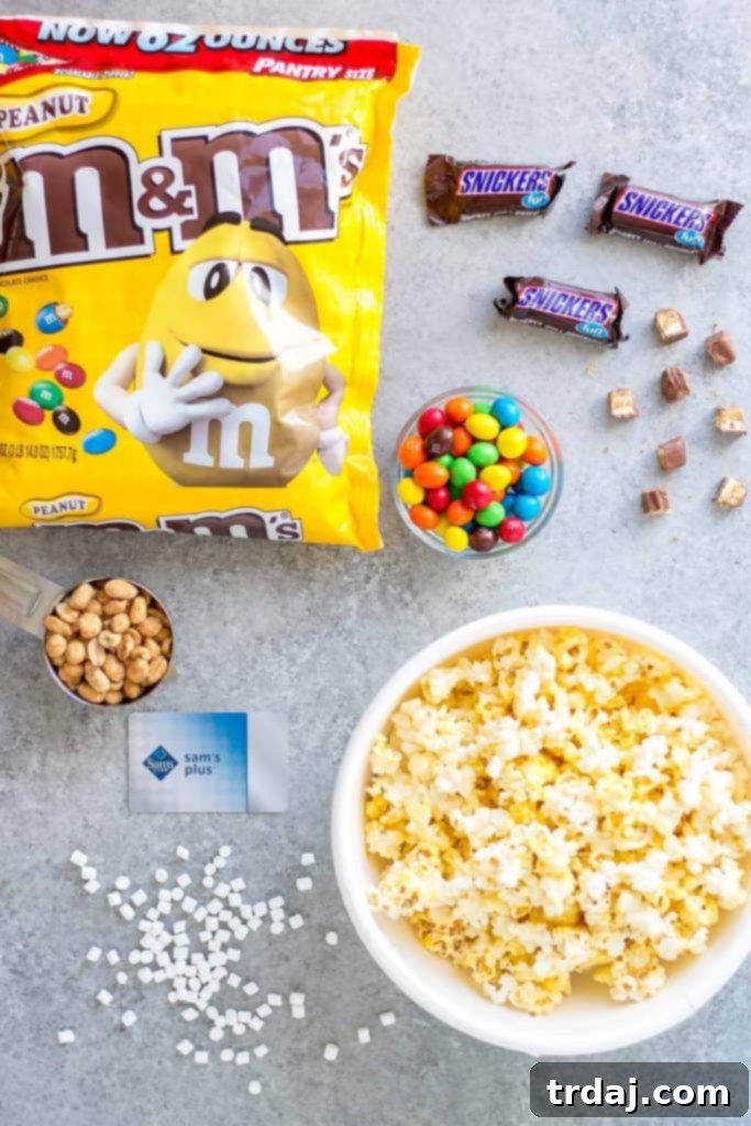 Rocky Road to Victory Popcorn is a game day lovers dream. Rich chocolate, salty popcorn and bits of candy pieces make this popcorn mix a must have at your next home gate! | Strawberry Blondie Kitchen