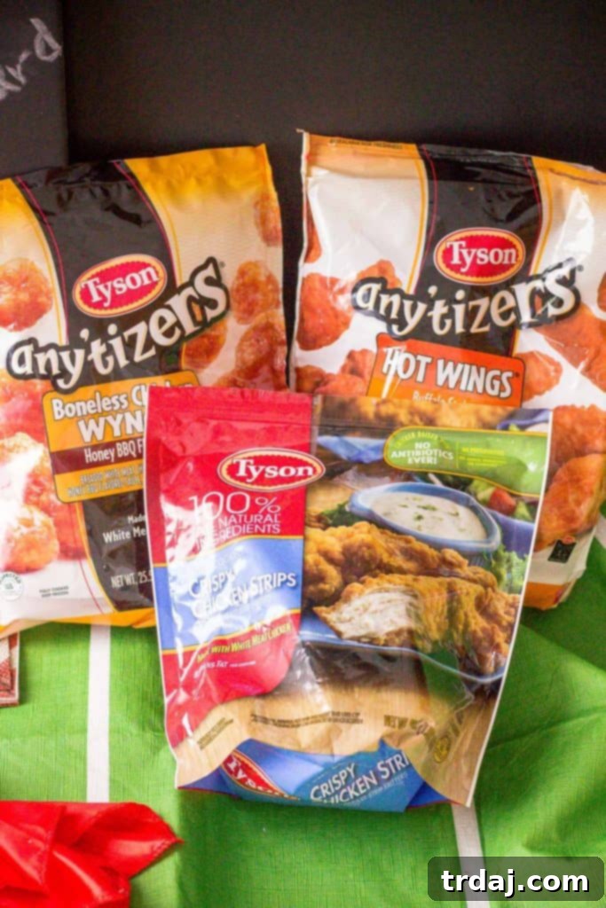 Family enjoying Tyson Any'tizers and Crispy Chicken Strips during homegating