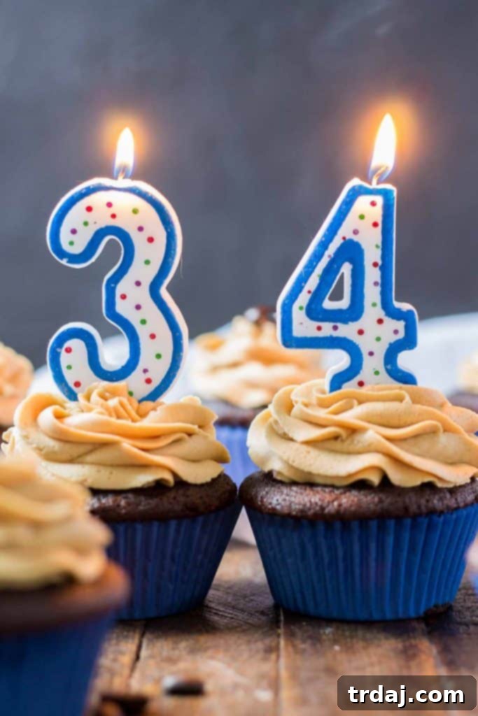 Closeup of a Peanut Butter Mocha Cupcake, showcasing the rich frosting swirl.