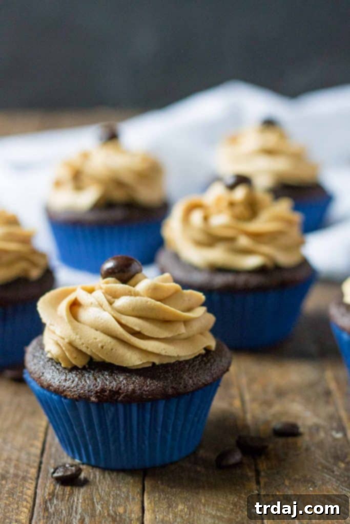 A top-down view of a beautifully frosted Peanut Butter Mocha Cupcake.