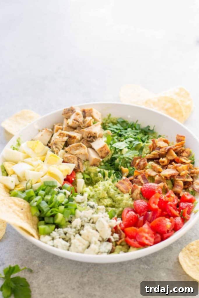 Close-up of California Cobb Guacamole with fresh ingredients