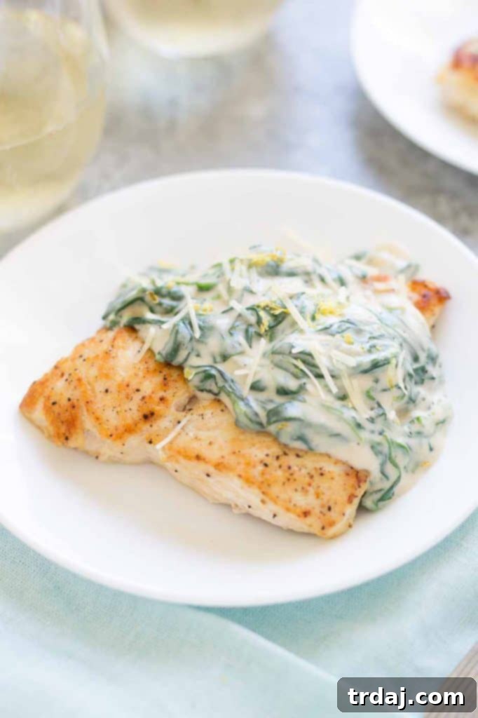 Creamy Chicken Florentine for two, featuring pan-roasted chicken with a rich spinach sauce.