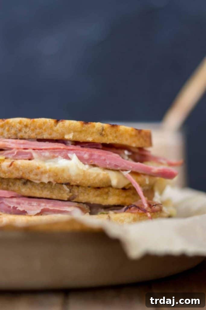 The finished Epic Reuben Sandwich, perfectly grilled with golden bread and oozing cheese