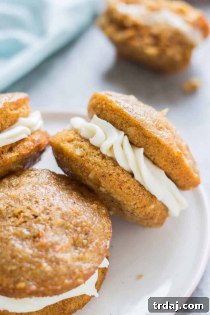 A stack of Carrot Cake Whoopie Pies ready to be served