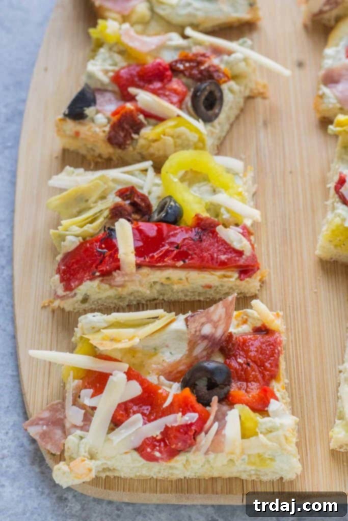Close-up of Antipasto Pizza slices showcasing vibrant toppings