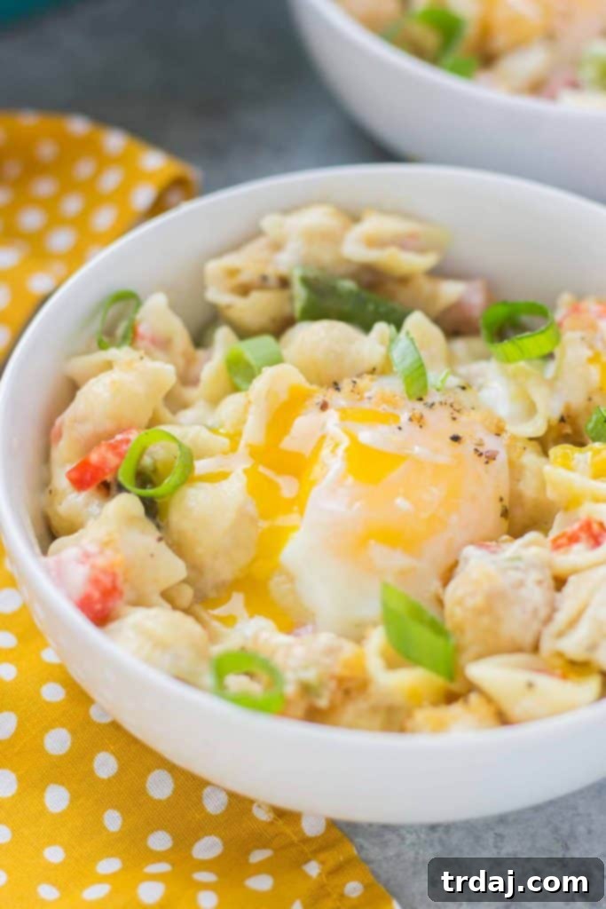 Close-up of golden-brown Breakfast Macaroni and Cheese, showing the rich, bubbly cheese sauce.