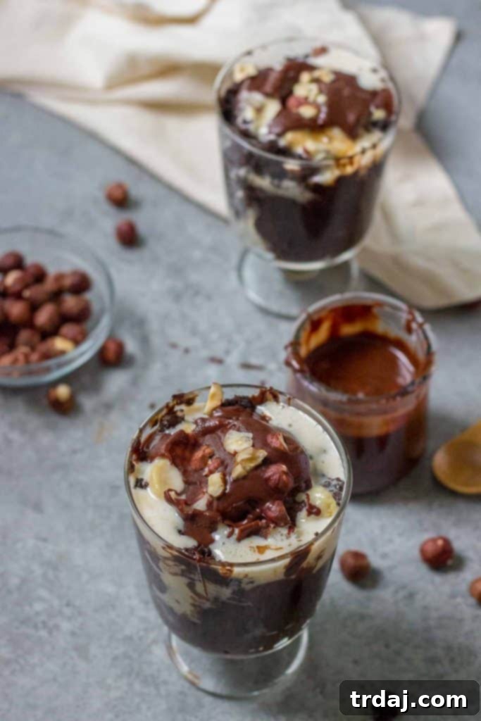 Close-up of a warm Hazelnut Pudding Cake in a slow cooker, showcasing its rich, moist texture and chocolatey layers